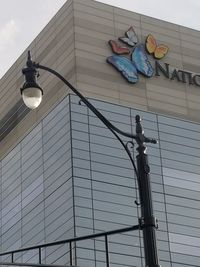 Low angle view of street light against sky