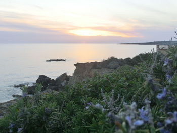 Scenic view of sea against sky during sunset