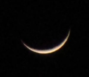 Close-up of moon over black background
