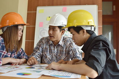 People working in kitchen