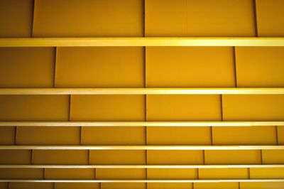 Full frame shot of yellow bridge ceiling