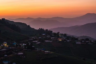 Scenic view of mountains against sky during sunset