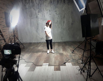 Full length of woman photographing