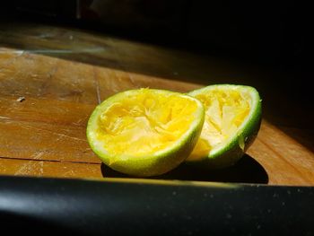 Close-up of lemon slice on cutting board