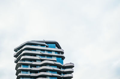 Low angle view of built structure against blue sky