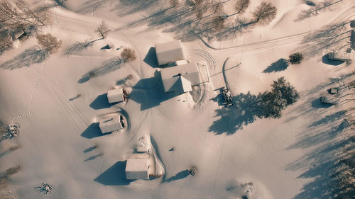 Aerial view of snow covered land