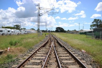 Railroad tracks against sky