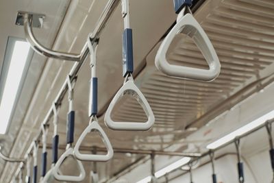 Low angle view of empty seats in train