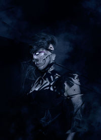 Digital composite image of woman with halloween make-up 