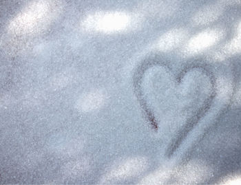 Full frame shot of snowflakes on snow