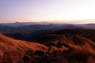 Scenic view of landscape against sky during sunset