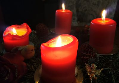 Close-up of illuminated tea light candle