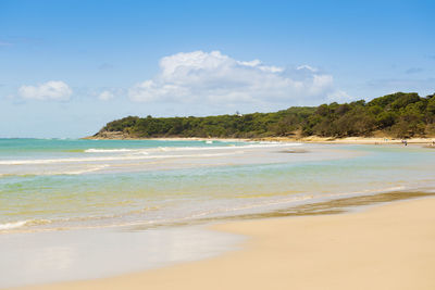 Beautiful blue sky and water on home beach, stradbroke island, australia