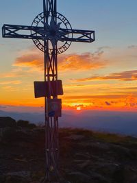 Scenic view of landscape against sky at sunset