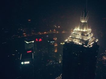 Illuminated cityscape at night