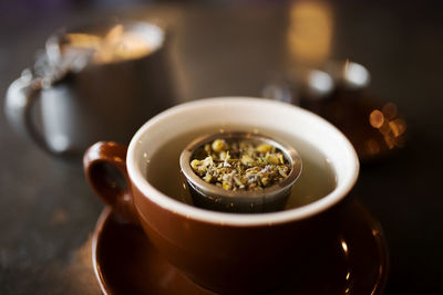 High angle view of spices in cup on table