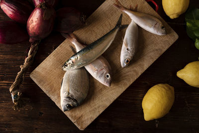 High angle view of chopped fish on cutting board