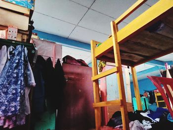 Clothes hanging at market stall