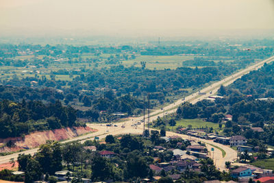 High angle view of buildings in city against sky