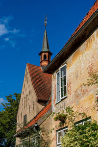 Low angle view of houses against sky