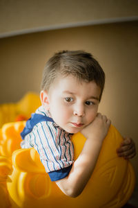 Portrait of cute boy at home