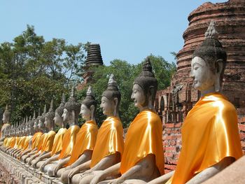 Low angle view of buddha statue