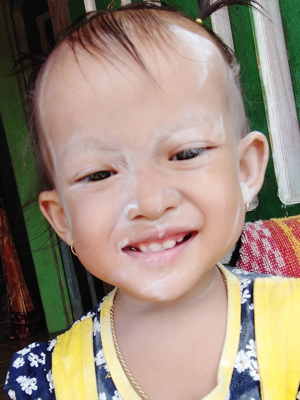 portrait, childhood, child, one person, headshot, front view, smiling, looking at camera, human face, person, happiness, emotion, innocence, cute, toddler, close-up, women, female, baby, skin, lifestyles, clothing, day, cheerful, human head, casual clothing, outdoors, human eye, facial expression, fun, nose, laughing