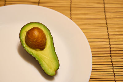 High angle view of sliced slices in plate on table