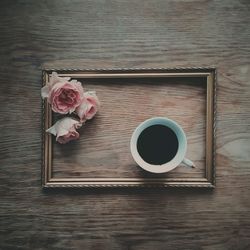 High angle view of coffee cup on table