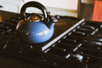 Close-up of teapot on stove