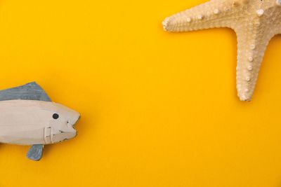 High angle view of yellow paper on table