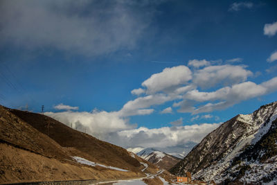 Scenic view of mountains against sky during winter