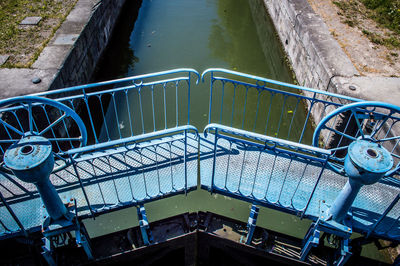 High angle view of empty sleuce bridge over canal