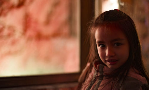 Close-up portrait of smiling girl