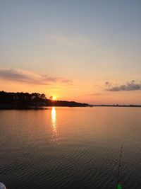 Scenic view of sunset over river