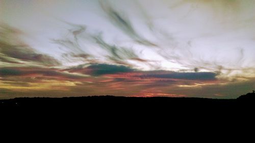 Scenic view of dramatic sky during sunset