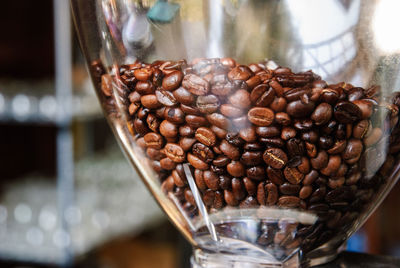 Close-up of coffee beans in glass