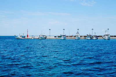 Boats in calm sea