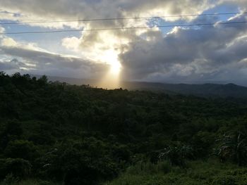 Scenic view of landscape against sky during sunset