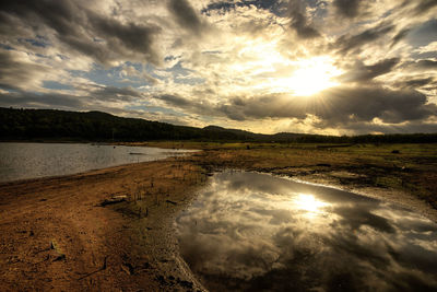 Sun shining over sea