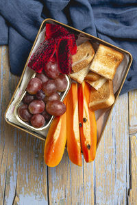 High angle view of fruits in bowl on table