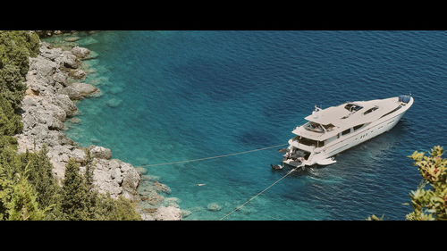 High angle view of sea against blue sky