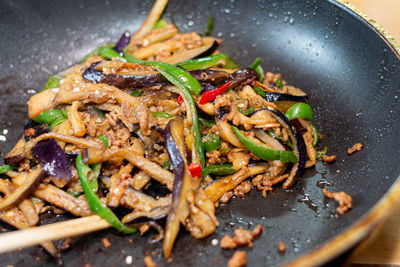 Close-up of meal served in pan