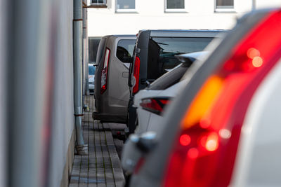 View of parked vehicle by building