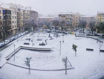 Ski lift in city during winter