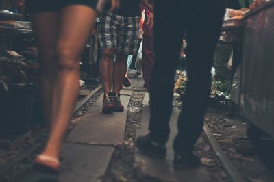 Blurred motion of woman in city at night