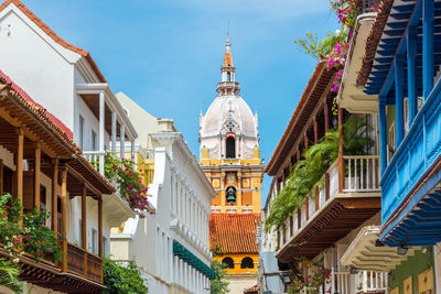 San pedro claver church amidst buildings against sky