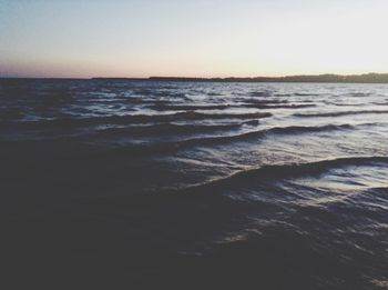 Scenic view of sea against sky at sunset