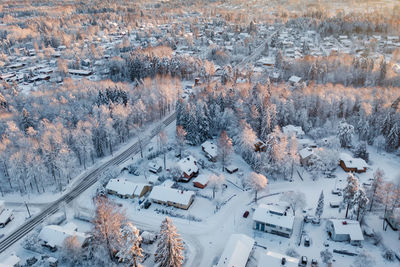 Suburban view from above with small houses and snow in espoo, finland