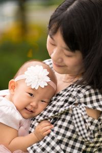 Portrait of mother and baby girl